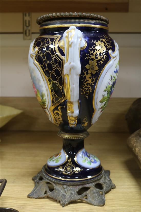 A pair of 19th century French porcelain urns, H 33cm